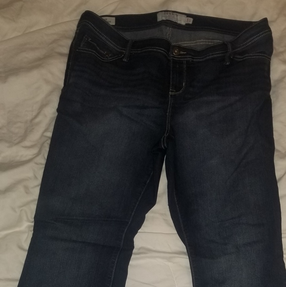 Torrid Luxe stretch slim boot cut jeans.